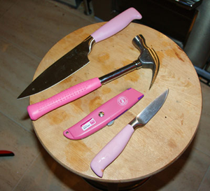 A photo of tools with pink handles